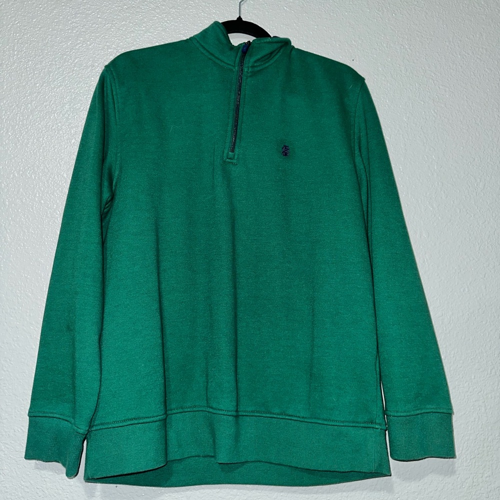 Brand is IZOD. The color is green. Size medium.